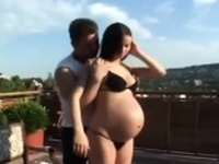 Pregnant brunette